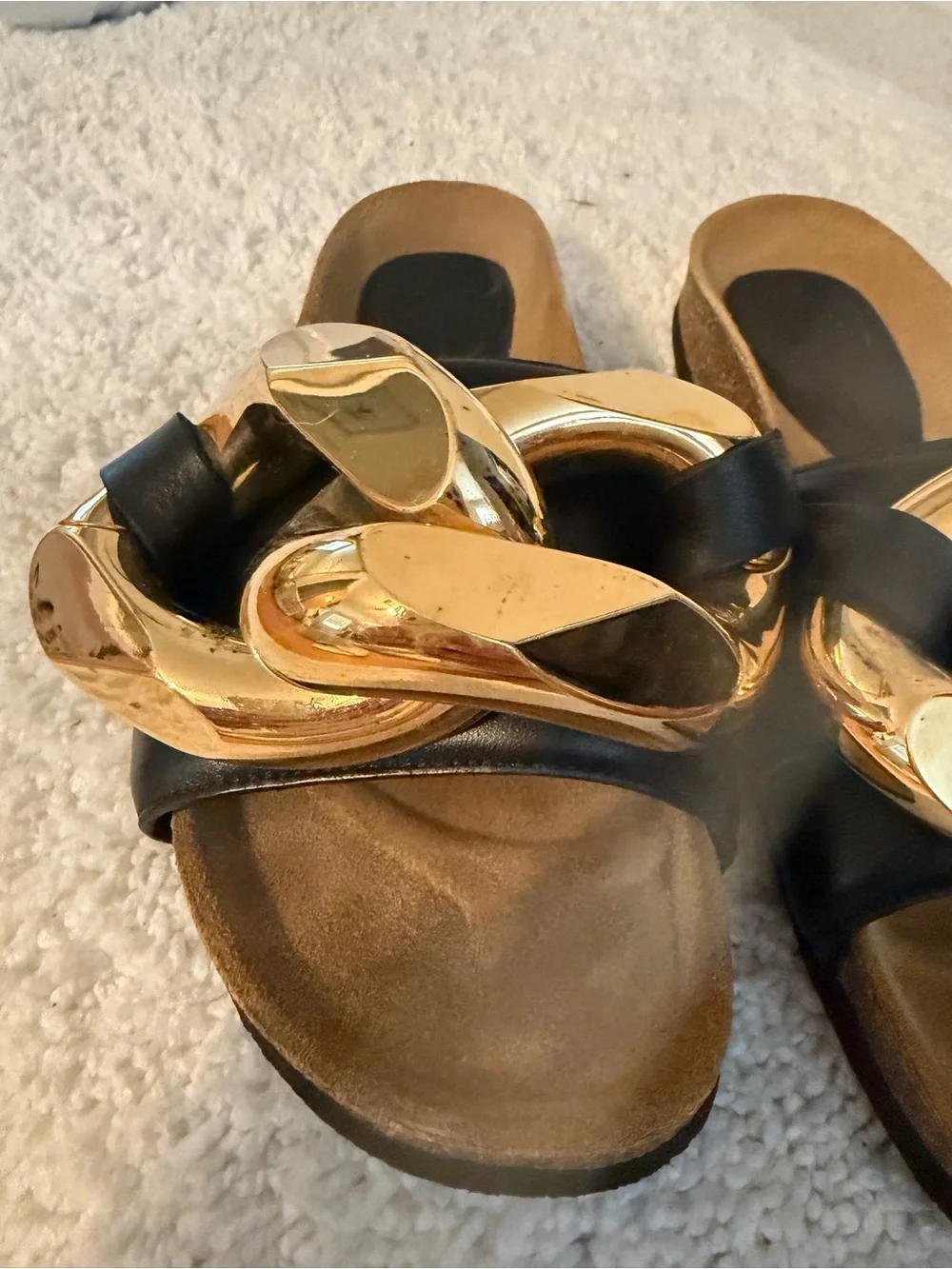 JW Anderson Women’s Black Slide Sandals with Gold Chain Accent
